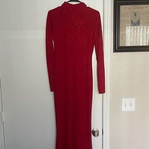 Large long sleeve sparkle red dress. Perfect for the holidays.